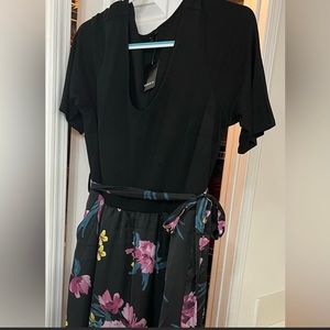 Brand new with tags Torrid V neck dress. Never worn.